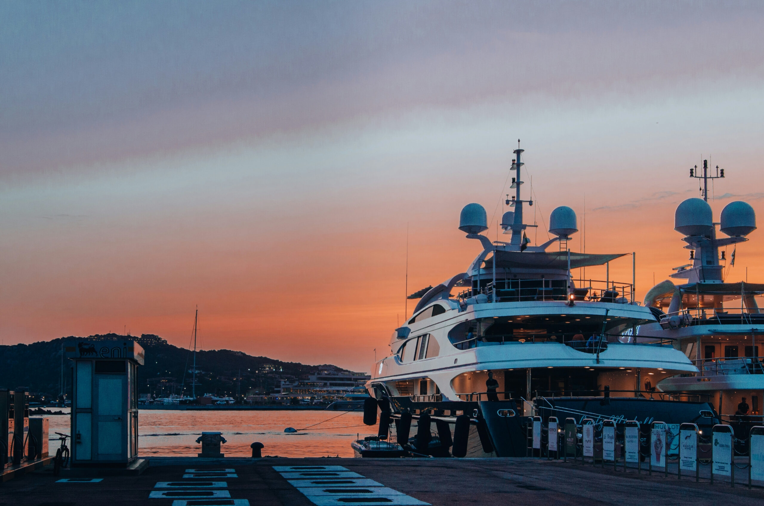 Luxury yacht in the harbor at sunset