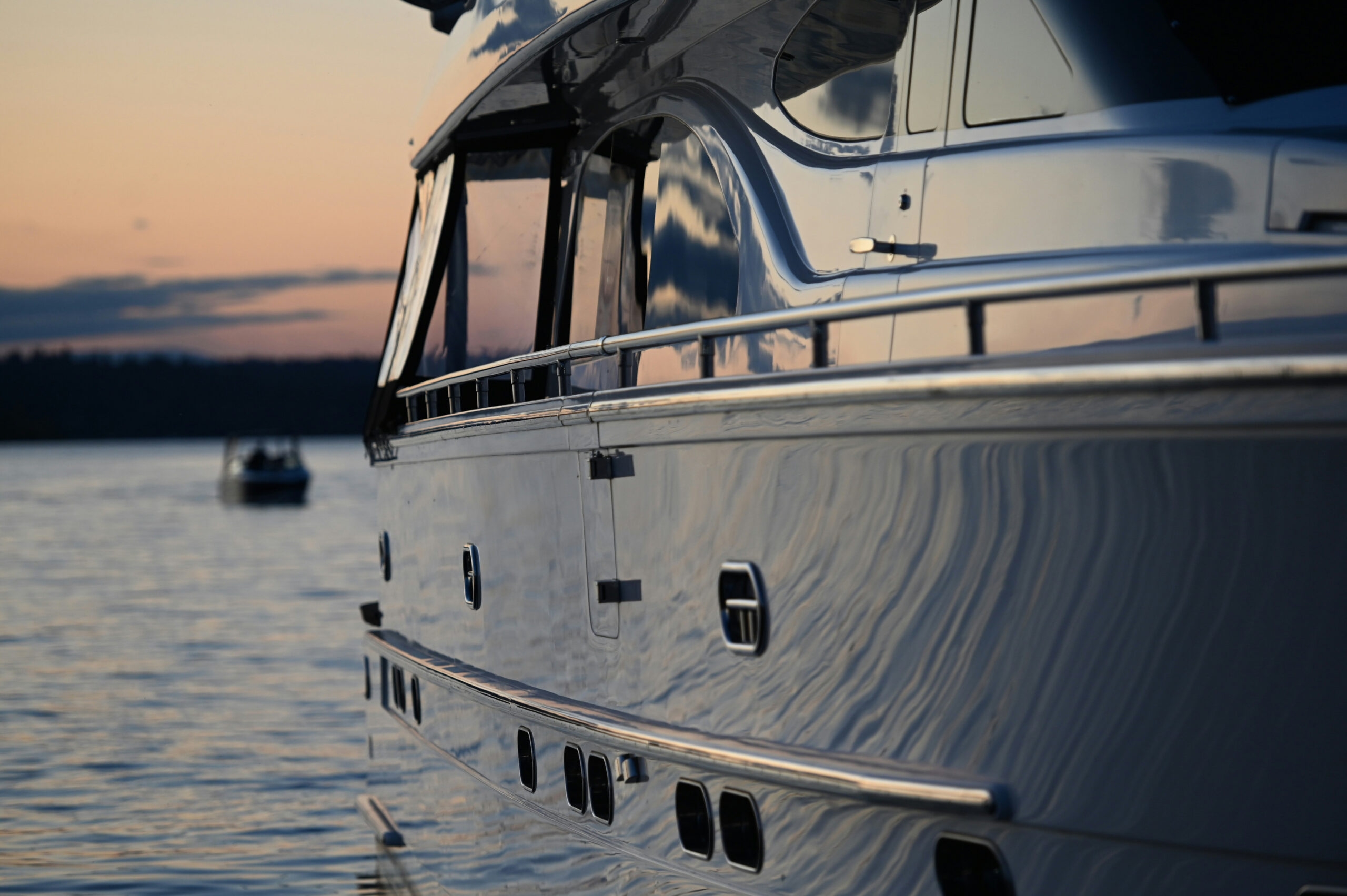Luxury yacht on the water at sunset