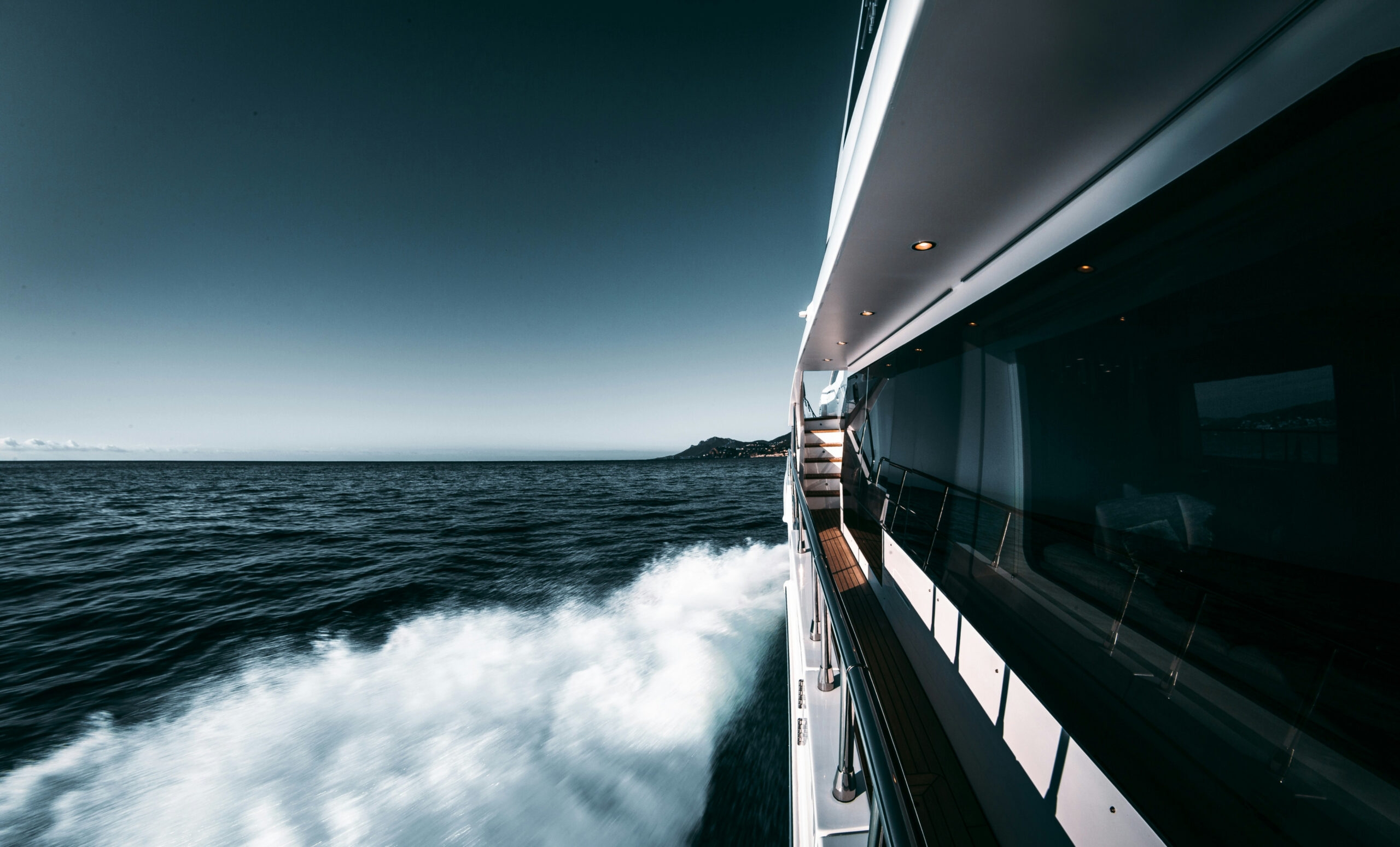 Luxury yacht sailing on the open sea.